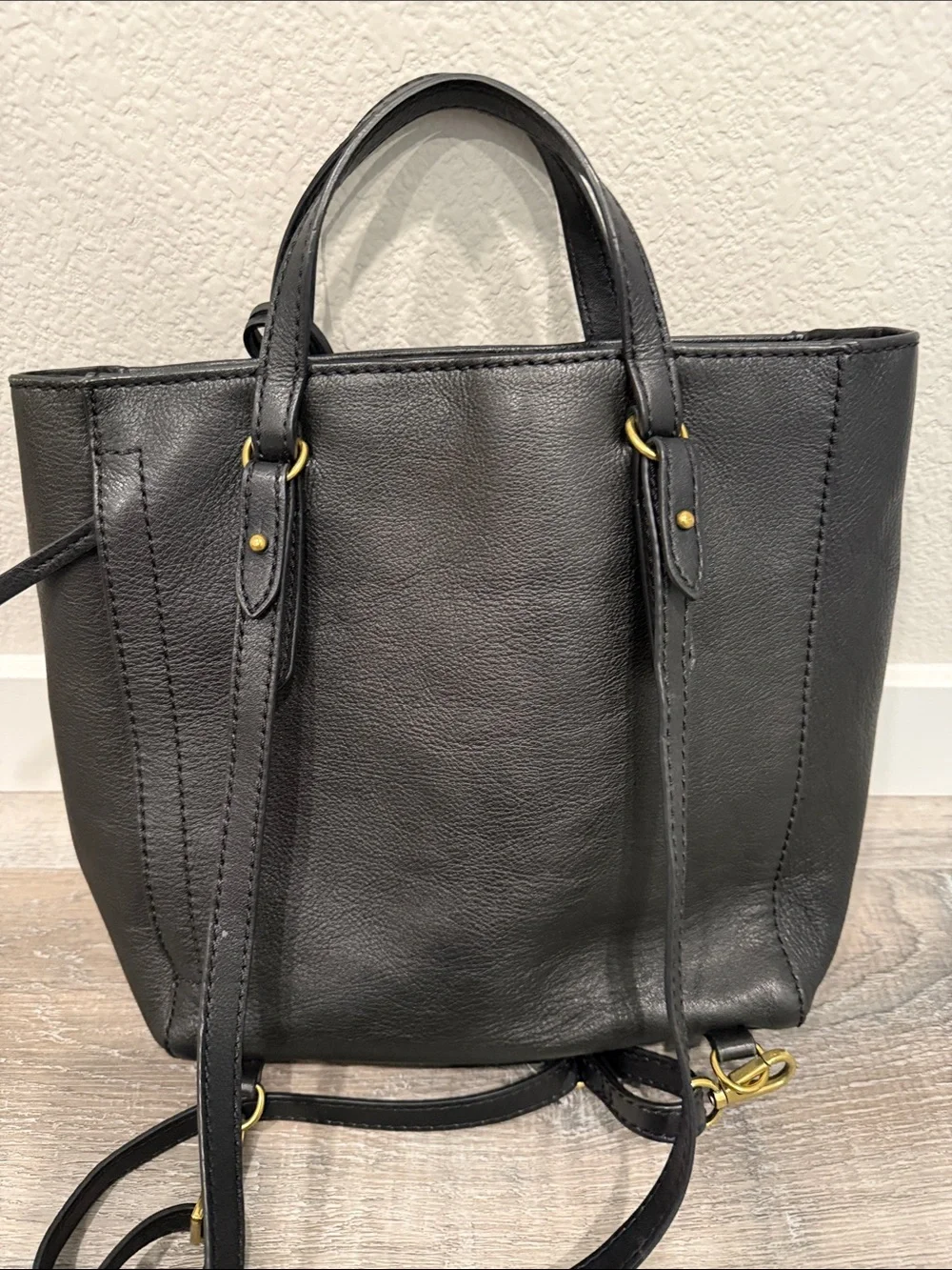 Fossil Camilla convertible black leather backpack purse.